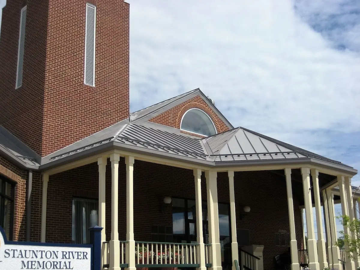 Skilled roofing craftsmen working on a residential roof in Hastings